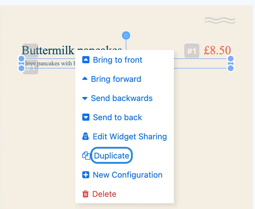 The right-click menu on a product element with Duplicate highlighted